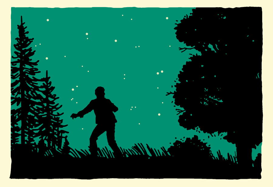 Man in a dark night looking for a path in jungle.
