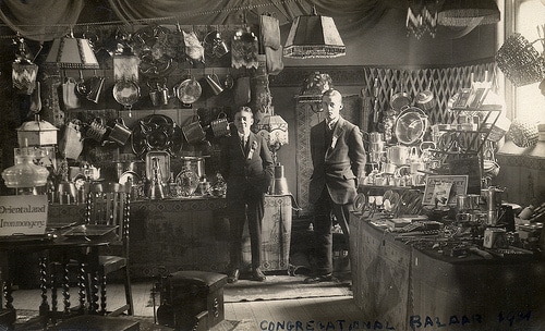 Two men consider starting a business in an invaluable shop.