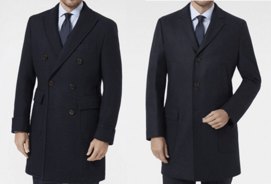 Man's wearing overcoat, over suit and tie.